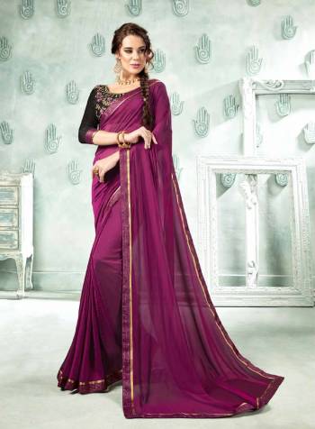 Rich and Elegant Looking Designer Saree Is Here In Purple Color Paired With Black Colored Blouse. This Saree Is Fabricated On Georgette Paired With Art Silk Fabricated Blouse. It Is Beautified With Resham Embroidery And Lace Border. 