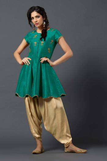 Grab The Seasons Trend With This Designer Readymade Pair Of Dhoti. Its Top Is Silk Based Paired With A Very Soft And Comfortable Muslin Fabricated Dhoti. This Lovely Dress Ensures Superb Comfort all Day Long. Buy Now.