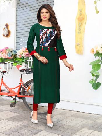 For Your College, Home Or Work Place, This Kurti Is Suitable For All. Grab This Dark Green Colored Rayon Fabricated Kurti. It Is Light In Weight And Easy To Carry All Day Long.