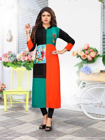 Grab This Readymade Kurti For Your Casual Or Semi-Casual Wear In Orange And Black Color Fabricated On Rayon. It Is Light Weight And Available In All Regular Sizes.