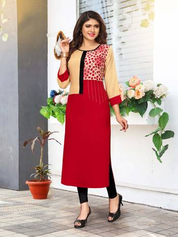 Simple And Elegant looking Readymade Kurti Is Here In Red And Cream Color Fabricated On Rayon. This Kurti Is Available In All Regular Sizes, Choose As Per Your Comfort.