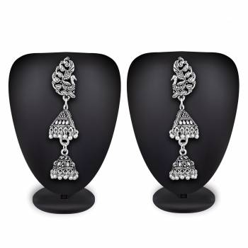 Buy This Pretty Pair Of Earrings In Silver Color Which Can Be Paired With Colored Attire. These Earrings Will Give A Pretty Elegant Look  Which Will eanr You Lots Of Compliments From Onlookers. 