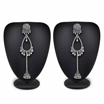 Buy This Pretty Pair Of Earrings In Silver Color Which Can Be Paired With Colored Attire. These Earrings Will Give A Pretty Elegant Look  Which Will eanr You Lots Of Compliments From Onlookers. 