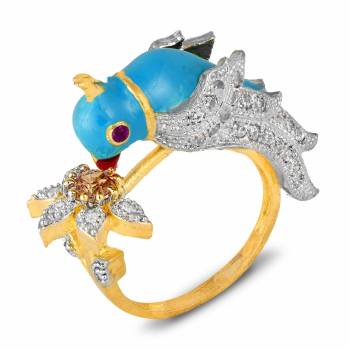 For A Quite Heavy Look, Grab This Pretty Peacock Patterned Ring With Multi Colored Stone Work. It Can e Paired With Any Colored Ethnic Attire.