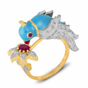 For A Quite Heavy Look, Grab This Pretty Peacock Patterned Ring With Multi Colored Stone Work. It Can e Paired With Any Colored Ethnic Attire.