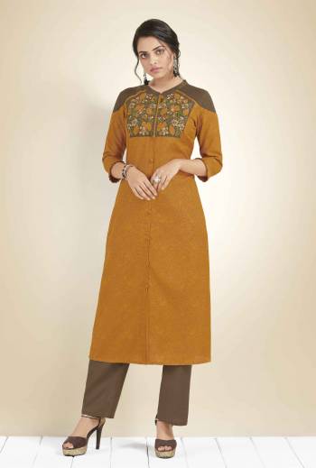 Here Is A Rich looking Designer Readymade Kurti In Musturd Yellow Color Fabricated On Cotton. It Is Beautified With Thread Work Over The Neck. Buy Now.