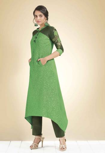 Add This Pretty Assymetric Patterned Designer Readymade Kurti To Your Wardrobe In Shades Of Green. It Is Fabricated On Cotton Beautified With Thread work. Also It Is Available In All Regular Sizes. 