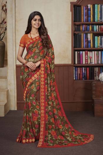 For Your Casual Or Semi-Casual Wear, Grab This Lovely Printed Saree Fabricated On Georgette. This Saree Is Beautified With Prints And Lace Border. 