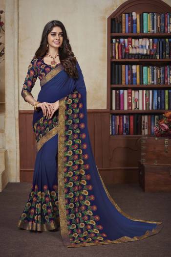 Comfort Comes First When Its About Casuals, Grab This Pretty Light Weight Saree Fabricated On Georgette Beautified With Prints And Lace Border. 