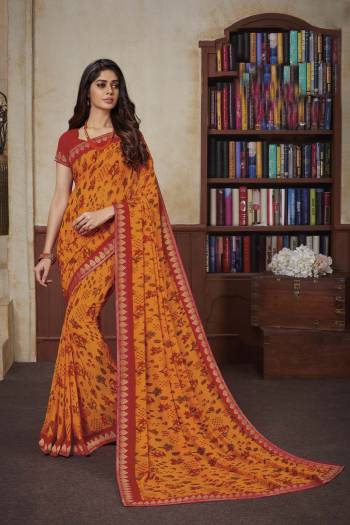 For Your Casual Or Semi-Casual Wear, Grab This Lovely Printed Saree Fabricated On Georgette. This Saree Is Beautified With Prints And Lace Border. 