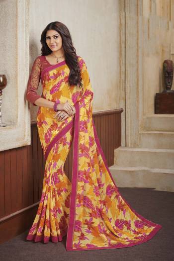 For Your Casual Or Semi-Casual Wear, Grab This Lovely Printed Saree Fabricated On Georgette. This Saree Is Beautified With Prints And Lace Border. 