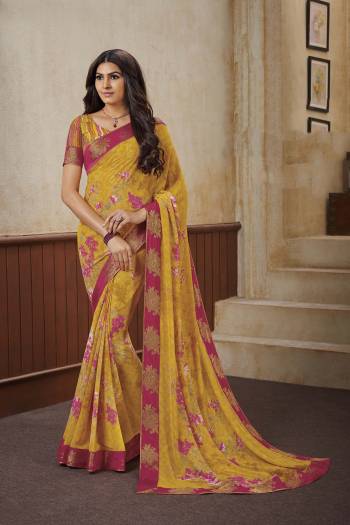 For Your Casual Or Semi-Casual Wear, Grab This Lovely Printed Saree Fabricated On Georgette. This Saree Is Beautified With Prints And Lace Border. 