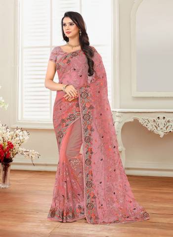 Grab This Heavy Designer Saree For The Upcoming Festive And Wedding Season With This Very Pretty Pink Colored Saree And Blouse. This Saree And Blouse Are Fabricated On Net Beautified With Heavy Embroidery All Over It. 