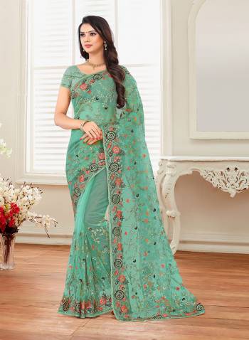 Grab This Heavy Designer Saree For The Upcoming Festive And Wedding Season With This Very Pretty Sea Green Colored Saree And Blouse. This Saree And Blouse Are Fabricated On Net Beautified With Heavy Embroidery All Over It. 