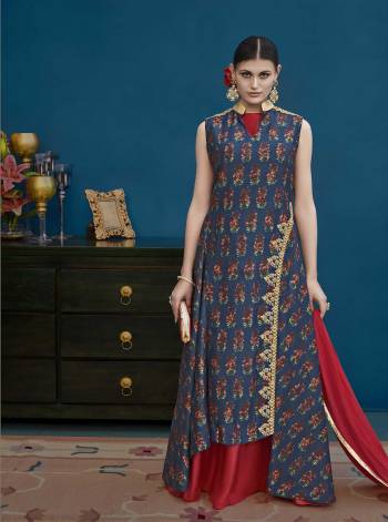 Grab This Designer Floor Length Suit In Navy Blue Colored Top And Bottom Paired With Red Colored Dupatta. Its Top Is Fabricated On Art Silk Paired With Santoon Bottom And Chiffon Dupatta. Its Red Colored Inner Is Giving Highlight To The Dress. 