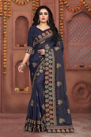 Here Is A Beautiful Designer Saree In Navy Blue Color Paired With Navy Blue Colored Blouse. This Saree And Blouse Are Fabricated On Art Silk Beautified With Jari Embroidery And Stone Work. Buy Now.