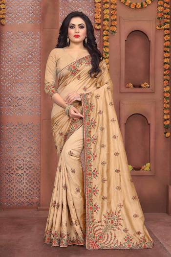 Flaunt Your Rich And Elegant Taste Wearing This Designer Embroidered Saree In Beige Color Paired With Beige Colored Blouse. This Saree And Blouse Are Fabricated On Art Silk Beautified With Thread Embroidery And Stone Work.