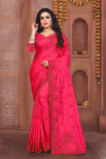 Flaunt Your Rich And Elegant Taste Wearing This Designer Embroidered Saree In Rani Pink Color Paired With Rani Pink Colored Blouse. This Saree And Blouse Are Fabricated On Art Silk Beautified With Thread Embroidery And Stone Work.