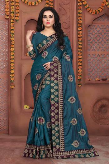 Grab This Beautiful Designer Saree In Blue Color Paired With Blue Colored Blouse. This Saree And Blouse Are Silk based Beautified With Jari Embroidery And Stone Work. It Is Suitable For Festive Or Party Wear.