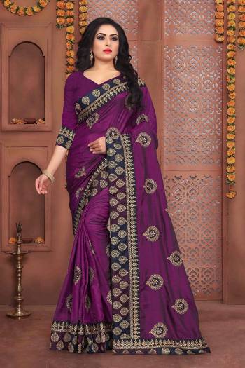 Grab This Beautiful Designer Saree In Purple Color Paired With Purple Colored Blouse. This Saree And Blouse Are Silk based Beautified With Jari Embroidery And Stone Work. It Is Suitable For Festive Or Party Wear.