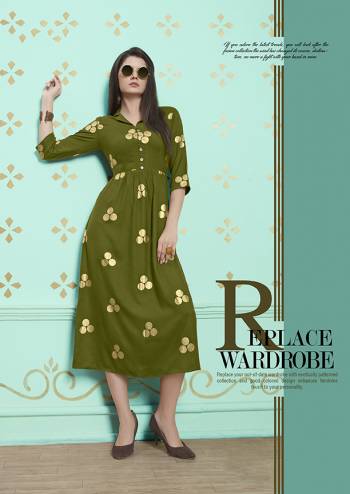 You Will Earn Lots Of Compliments Wearing This Designer Readymade Kurti In Olive Green Color Fabricated On Rayon Cotton. It Is Beautified With Bold Polka Prints All Over. 