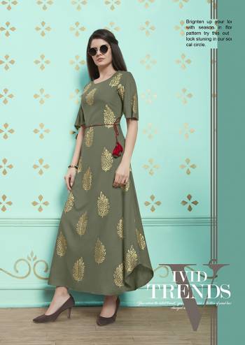 Flaunt Your Rich And Elegant Taste Wearing This Designer Readymade Long Kurti In Grey Color. It Is Fabricated On Rayon cotton Beautified With Prints All Over. It Is Soft Towards Skin And Easy To Carry All Day Long.