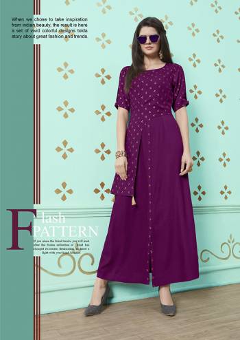 You Will Earn Lots Of Compliments Wearing This Designer Readymade Kurti In Purple Color Fabricated On Rayon Cotton. It Is Beautified With Small Polka Prints And New Cuts Pattern. 