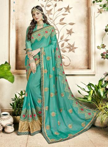 This Festive Season Has Bright Shades Trend, So Grab This Designer Saree In Sea Green Color Paired With Sea Green Colored Blouse. This Saree Is Fabricated On Georgette Paired With Art Silk Fabricated Blouse. It Is Easy To Drape And Carry All Day Long.