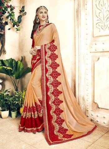 A Must Have Shade In Every Womens Wardrobe Is Here With This Designer Saree In Peach Color Paired With Contrasting Red Colored Blouse. This Saree Is Fabricated On Georgette Paired With Art Silk Fabricated Blouse. 