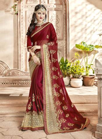 Celebrate This Festive Wearing This Designer Saree In Maroon Color Paired With Maroon Colored Blouse. This Saree Is Georgette Based Paired With Art Silk Fabricated Blouse. It Is Light Weight And Easy To Carry All Day Long.