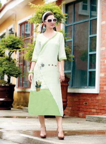 Here Is A Simple And Elegant Designer Readymade Kurti Is Here In White And Green Color Fabricated On Linen. It Is Beautified with Pretty Patch Work And Available In All Regular Sizes. 