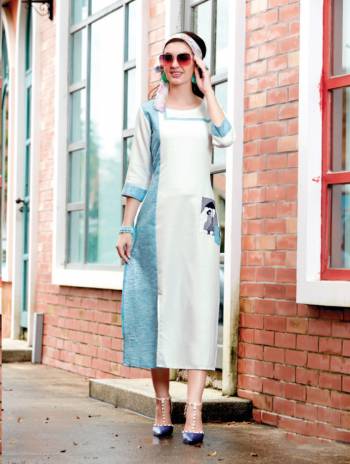 Grab This Designer Readymade Kurti For Your Semi-Casual Wear In White And Light Blue Color Fabricated On Linen Beautified With Patch Work.