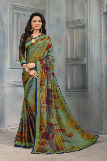 Go Colorful With This Printed Saree In Multi Color Fabricated On Chiffon. This Saree Is Light In Weight, Easy to Drape And Durable. It Is Suitable For Your Casual Or Semi Casual Wear. Buy Now.