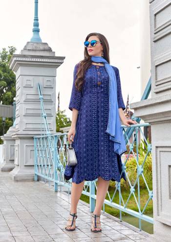 Rich And Elegant Looking Designer Kurti Is Here In Blue Color Fabricated On Pashmina Beautified With Prints And Buttons. It Is Light Weight And Easy To Carry All Day Long. 