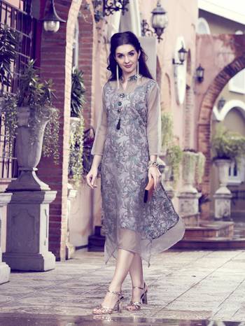 Rich And Elegant Looking Designer Readymade Kurti Is Here In Grey Color Fabricated On Oragenza And Crepe Silk Beautified With Prints All Over. Buy Now.4