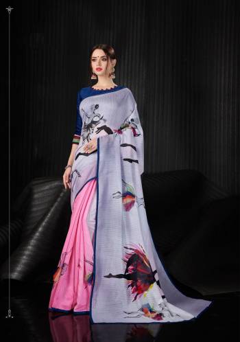 Grab This Beautiful Printed Saree For Semi-Casual Or Festive Wear. This Saree And Blouse Are Fabricated On Linen Silk Beautified With Bold Prints All Over. 