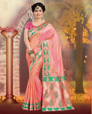 A Must Have Shade In Every Womens Wardrobe Is Here In Peach Color Paired With Contrasting Dark Pink Colored Blouse. This Saree and Blouse Are Fabricated On Art Silk  Which Also Gives A Rich Look To Your Personality. 