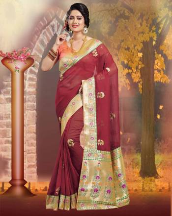 For A Royal Look, Grab This Silk Based Saree In Maroon Color Paired With Contrasting Orange Colored Blouse. This Saree And Blouse Are Fabricated on Art Silk Which IS Durable And Easy To Carry All Day Long.