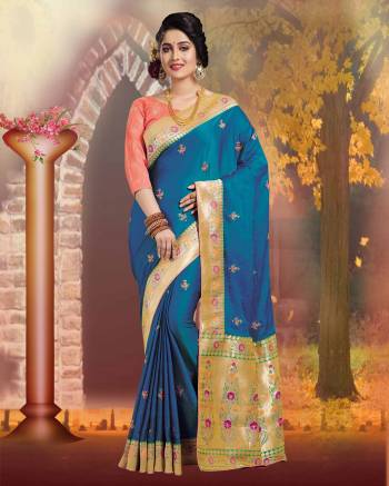 Pretty Shades Are Here With This Designer Silk Saree In Blue Color Paired With Light Orange Colored Blouse. This Saree And Blouse Are Fabricated On Art Silk Beautified With Weave And Jari Work. 