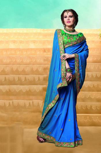 Cool Color Pallete Is Here With This Designer Saree In Blue Color Paired With Contrasting Green colored Blouse. This Saree And Blouse are Silk Based Which Gives A Rich And Elegant Look To Your Personality. 