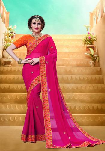 Bright And Visually Appealing Color Is Here In With This Designer Saree In Dark Pink Color Paired With Orange Colored Blouse. This Saree Is Fabricated On Georgette Paired With Art Silk Fabricated Blouse. 