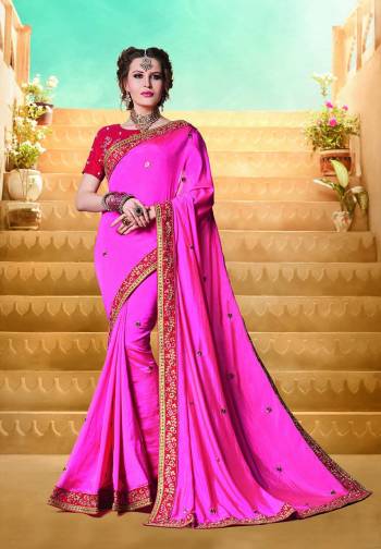 Look Pretty In This Pretty Pink Colored Saree Paired With Contrasting Red Colored Blouse. This Saree Is Fabricated On Satin Silk Paired With Art Silk Fabricated Blouse. Grab This Lovely Color Pallete Now.