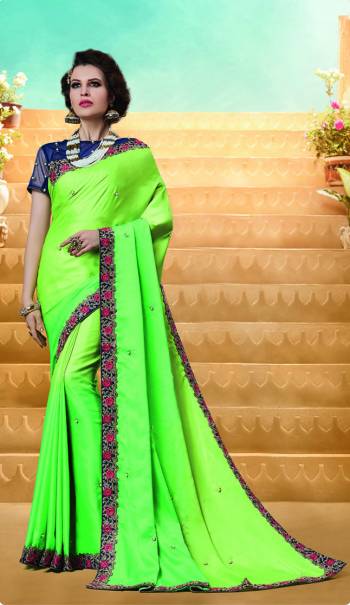 Grab This Pretty Saree In Light Green Color Paired With Contrasting Navy Blue Colored Blouse. This Saree Is Fabricated On Satin Silk Paired With Art Silk And Net Fabricated Blouse. All Its Fabrics Ensures Superb Comfort All Day Long. Buy Now.