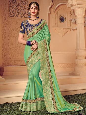 Presenting this green color two tone silk saree. Ideal for party, festive & social gatherings. this gorgeous saree featuring a beautiful mix of designs. Its attractive color and heavy designer saree, attractive Designs, stone design, beautiful floral design work over the attire & contrast hemline adds to the look. Comes along with a contrast unstitched blouse.