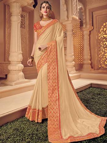 marvelously charming is what you will look at the next wedding gala wearing this beautiful beige color two tone silk saree. Ideal for party, festive & social gatherings. this gorgeous saree featuring a beautiful mix of designs. Its attractive color and heavy designer saree, attractive Designs, stone design, beautiful floral design work over the attire & contrast hemline adds to the look. Comes along with a contrast unstitched blouse.