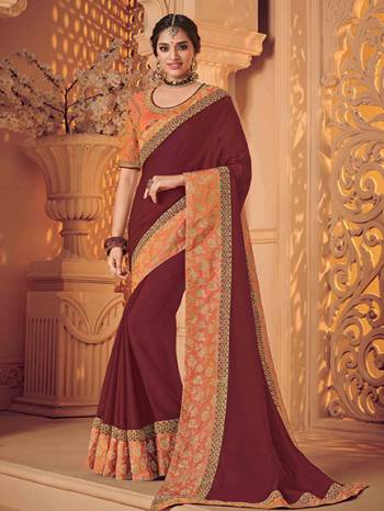 Wear this maroon color two tone satin silk saree. Ideal for party, festive & social gatherings. this gorgeous saree featuring a beautiful mix of designs. Its attractive color and heavy designer saree, attractive Designs, stone design, beautiful floral design work over the attire & contrast hemline adds to the look. Comes along with a contrast unstitched blouse.