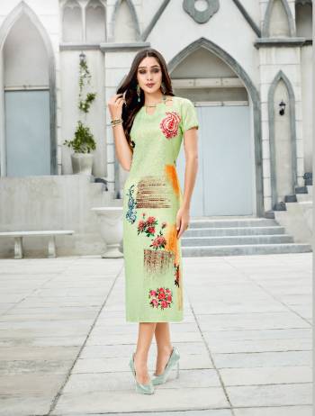 Pretty Shades Are Here With This Readymade Kurti In Light Green Color Fabricated On Linen. It Has Pretty Floral Prints Over The Panel. Buy Now.