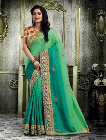 Grab This Shaded Green Colored Saree Paired With Beige Colored Blouse. This Saree And Blouse are fabricated On Art Silk Beautified With Attractive Embroidery All Over.Buy Now.