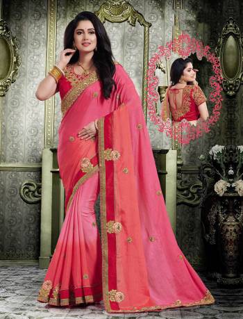 Look Pretty Wearing This Saree In Pink Paired With Red Colored Blouse. This Saree And Blouse Are Silk Based Beautified With Embroidery All Over. Buy Now.