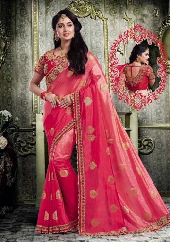 Bright And Visually Appealing Color Is Here With This Designer Saree In Dark Pink Color Paired With Red Colored Blouse. This Saree Is Fabricated On Rich Silk Which Earns You Lots Of Compliments From Onlookers. 